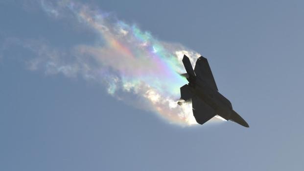 A U.S. Air Force F-22 Raptor banks left causing vapor contrails during an aerial demonstration at the Australian International Airshow and Aerospace and Defense Exposition (AVALON) on March 3, 2017, in Geelong, Australia. (U.S. Air Force photo/John Gordinier)