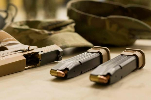 In January 2017, the Army selected Sig Sauer to produce the XM17 full-size MHS and the XM18 compact MHS. Sig Sauer partnered with Winchester to provide the ammunition. (U.S. Army photo)