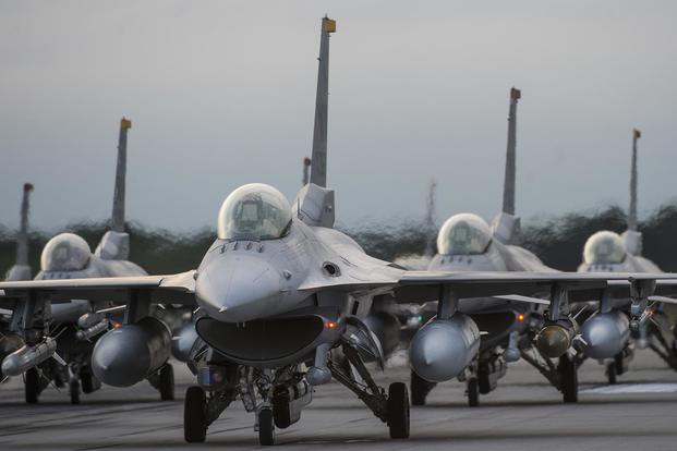 F-16 Fighting Falcons line the runway during an elephant walk at Misawa Air Base, Japan, on Sept. 16, 2017. Deana Heitzman /Air Force