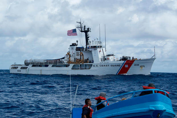 The crew of the Coast Guard Cutter Active, a 210-foot medium endurance Reliance-class cutter homeported in Port Angeles, Washington, interdicts more than 1 ton of cocaine from four suspected drug smugglers during a counter-narcotics patrol in the eastern Pacific Ocean, Friday, May 18, 2018. (U.S. Coast Guard photo/Michael De Nyse)