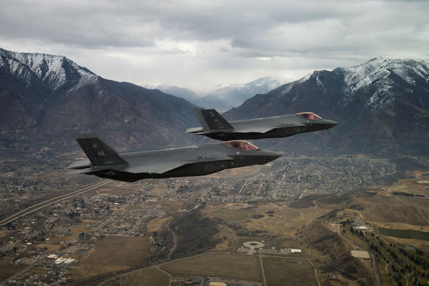 Two U.S. Air Force F-35A Lightning IIs, assigned to the 4th Fighter Squadron from Hill Air Force Base, Utah, fly over the base and the surrounding area on Feb 14, 2018. (U.S. Air Force photo/Andrew Lee)
