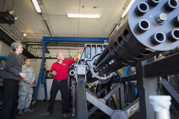 Secretary of the Air Force Heather Wilson learns about the GAU-8 30-millimeter cannon from Bob DuPont of the 780th Test Squadron on May 4 at Eglin Air Force Base. Samuel King Jr./Air Force