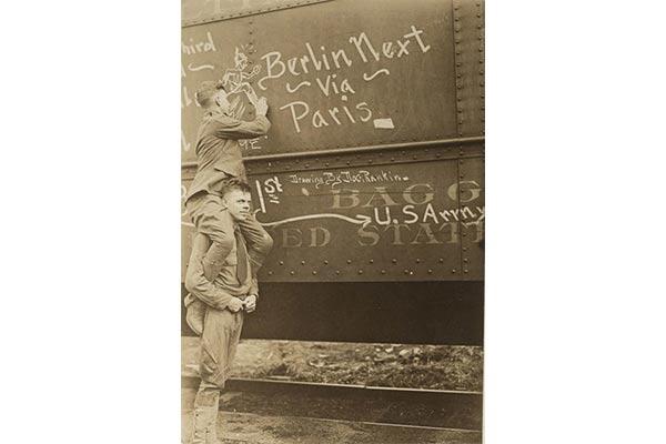 New York recruits heading to training write messages on the sides of their train. (Photo: National Archives and Records Administration)