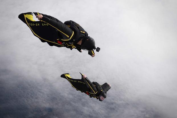 Members of the Army's Golden Knights demonstration team conduct a training jump over Homestead Air Reserve Base on Jan. 19, 2016. (U.S. Air National Guard Staff Sgt. Christopher S. Muncy)