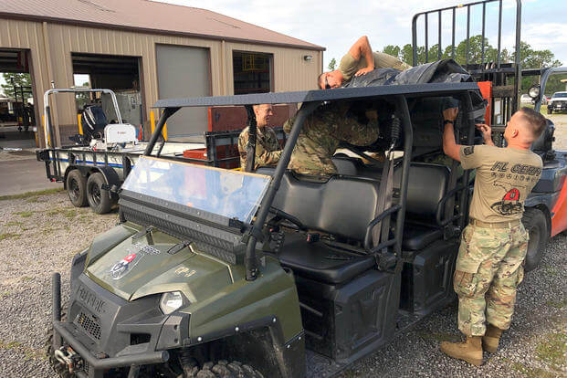 Florida National Guard soldiers, from the CBRN Enhanced Response Force Package (CERFP), load equipment and prepare for potential missions responding to Hurricane Dorian. (Florida National Guard photo/David Sterphone)