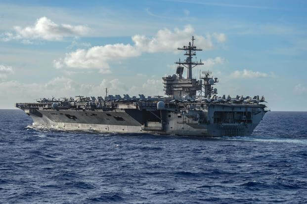 The aircraft carrier USS Theodore Roosevelt (CVN 71) participates in dual carrier operations June 23, 2020 in the Philippine Sea (Sean Lynch/U.S. Navy)