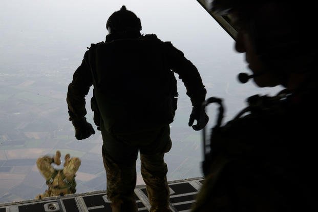 Air Commandos make jump over England.