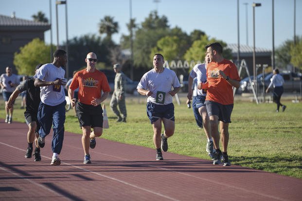 We Have York Pace members help an Air Force airman during a physical fitness test.
