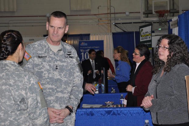 Maj. Gen. Patrick Murphy, the adjutant general of New York, speaks to a National Guard soldier during a Hiring our Heroes job fair.