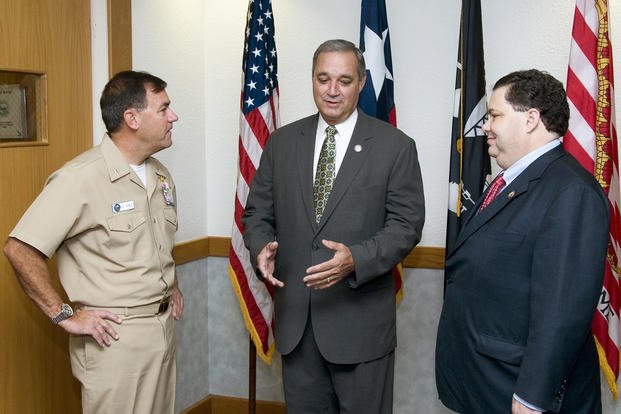 U.S. Reps. Jeff Miller, center, and Blake Farenthold visit Rear Adm. Bill Sizemore, chief of Naval Air Training, at CNATRA headquarters in Corpus Christi, Texas.