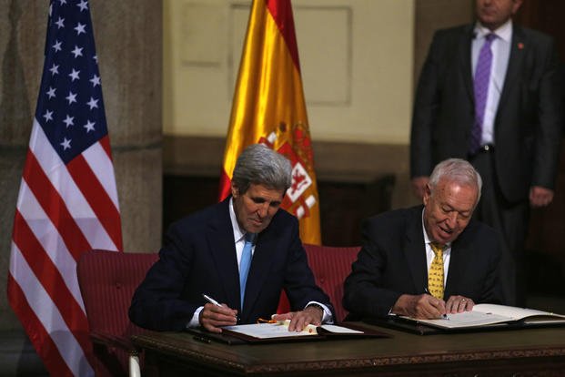 U.S. Secretary of State John Kerry, left, and Spain's foreign minister, Jose Manuel Garcia Margallo, sign agreements at the Santa Cruz palace, Spain's Foreign Affairs Ministry, in Madrid, Spain, Monday, Oct. 19, 2015. Spain and the U.S. agreed to further discuss the cleanup and removal of land contaminated with radioactivity after a midair collision in 1966 dumped 4 U.S. hydrogen bombs near the southern Spanish village of Palomares. (Francisco Seco/AP Photo) U.S. Secretary of State John Kerry, left, and Spain's foreign minister, Jose Manuel Garcia Margallo, sign agreements at the Santa Cruz palace, Spain's Foreign Affairs Ministry, in Madrid, Spain, Monday, Oct. 19, 2015. Spain and the U.S. agreed to further discuss the cleanup and removal of land contaminated with radioactivity after a midair collision in 1966 dumped 4 U.S. hydrogen bombs near the southern Spanish village of Palomares.