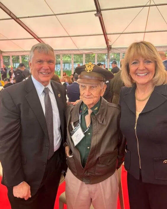 The author and his wife, retired Maj. Gen. Maggie Woodward, met WWII veterans at the D-Day 80th anniversary commemoration. (Photo courtesy of Dan Woodward) The author and his wife, retired Maj. Gen. Maggie Woodward, met WWII veterans at the D-Day 80th anniversary commemoration. (Photo courtesy of Dan Woodward)