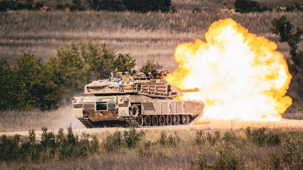A M1A2 SEPv3 Abrams Main Battle Tank with Berserker Company, 1st Battalion 9th Cavalry Regiment, 2ABCT, 1st Cavalry Division engages a target down range at Fort Hood, Texas, on October 3rd, 2022. (Photo by Sgt. James Dunn) A M1A2 SEPv3 Abrams Main Battle Tank with Berserker Company, 1st Battalion 9th Cavalry Regiment, 2ABCT, 1st Cavalry Division engages a target down range at Fort Hood, Texas, on October 3rd, 2022. (Photo by Sgt. James Dunn)