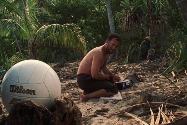 Stranded FedEx executive Chuck Noland (Tom Hanks) is stranded on a deserted island with his companion, a volleyball named Wilson. (Photo courtesy of IMDB.com) Stranded FedEx executive Chuck Noland (Tom Hanks) is stranded on a deserted island with his companion, a volleyball named Wilson.