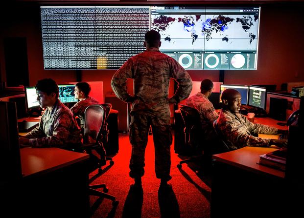 Cyberwarfare specialists serving with the 175th Cyberspace Operations Group of the Maryland Air National Guard engage in weekend training at Warfield Air National Guard Base, Middle River, Md. (Air Force photo by J.M. Eddins Jr.)