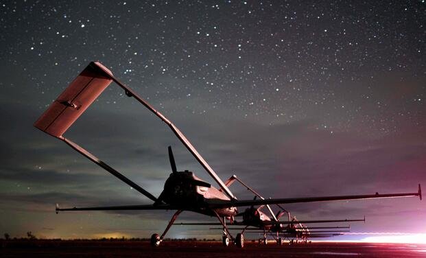 Long-range drones An-196 Liutyi of the Ukrainian 14th Separate Unmanned Aerial Systems Regiment stand in line before takeoff in undisclosed location, Ukraine, Tuesday, Oct. 14, 2025. (AP Photo/Evgeniy Maloletka) APTOPIX Russia Ukraine War Deep Strikes