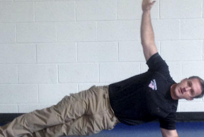 Stew Smith demonstrating side plank.