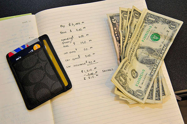 Wallet with cash (U.S. Air Force photo/Senior Airman Grace Lee) 