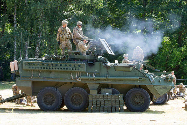 Soldiers, with P Troop, 4th Squadron, 2nd Cavalry Regiment, fire an Mk-19 automatic grenade launcher during a live-fire exercise in Wedrzyn, Poland, Aug. 27, 2015. (U.S. Army/Spc. Marcus Floyd)