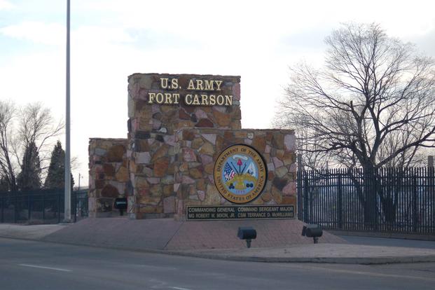Sign welcomes visitors to Fort Carson, Colorado 
