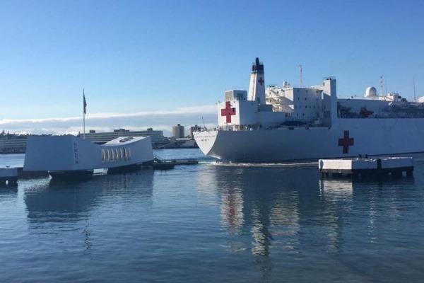 The photo shows the USNS Mercy sailing dangerously close to the USS Arizona Memorial. (Photo by Navy sailor)
