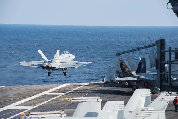 An F/A-18F Super Hornet launches from the aircraft carrier USS George H.W. Bush (CVN 77) in support of Operation Inherent Resolve. (U.S. Navy/Mass Communication Specialist 3rd Class Danny Ray Nunez Jr.)