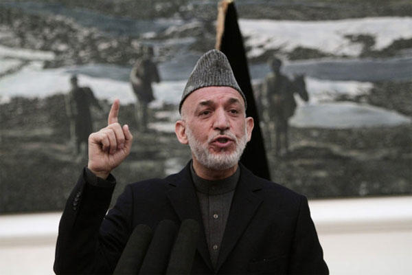 Karzai speaks at a news conference.