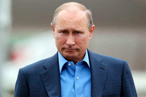 Russian President Vladimir Putin arrives at Belfast International Airport, in Northern Ireland, on Monday, June 17, 2013.