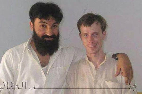n this undated photo provided my MEMRI, Sgt. Bowe Bergdahl is seen posing with a senior member of the Haqqani network in Afghanistan.MEMRI