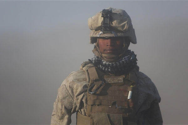 Marine Cpl. Osmar S. Gorish, a section chief for Battery A, 1st Battalion, 11th Marine Regiment, 1st Marine Division, returns to his team during Exercise Desert Scimitar 2015, April 20, 2015. (DoD photo)