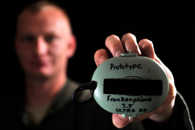 Staff Sgt. Marion, a 42nd Attack Squadron sensor operator, displays his invention, the “Frankenphone 3.5 Ultra High Definition,” March 24, 2015, at Creech Air Force Base, Nev. (U.S. Air Force photo/Airman 1st Class Christian Clausen)