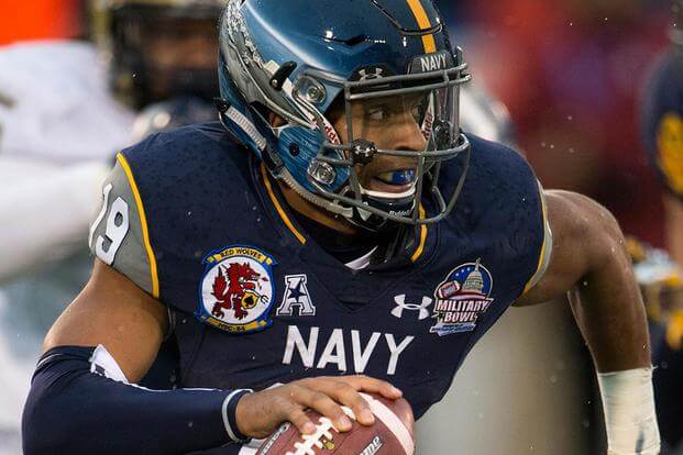 Navy's Keenan Reynolds scrambles in the second quarter of the 2015 Military Bowl at Navy-Marine Corps Stadium in Annapolis, Md., Dec. 28, 2015. (DoD News photo by EJ Hersom/Released)