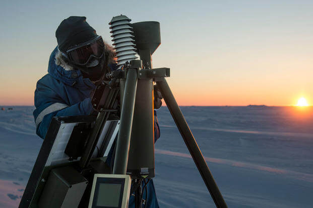 Aerographer's Mate 1st Class Daryl Meer, assigned to Fleet Weather Center Norfolk, sets up an Advanced Automated Weather Observation System during Ice Exercise (ICEX) 2016. (Photo: Mass Communication Specialist 2nd Class Tyler N. Thompson)