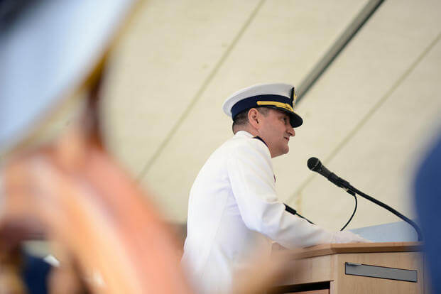 Capt. Anthony Ceraolo reads his orders assuming command of Coast Guard Sector San Francisco from Capt. Greg Stump July 19, 2016, during a change of command ceremony held on Yerba Buena Island. (Photo: Petty Officer 3rd Class Adam Stanton)