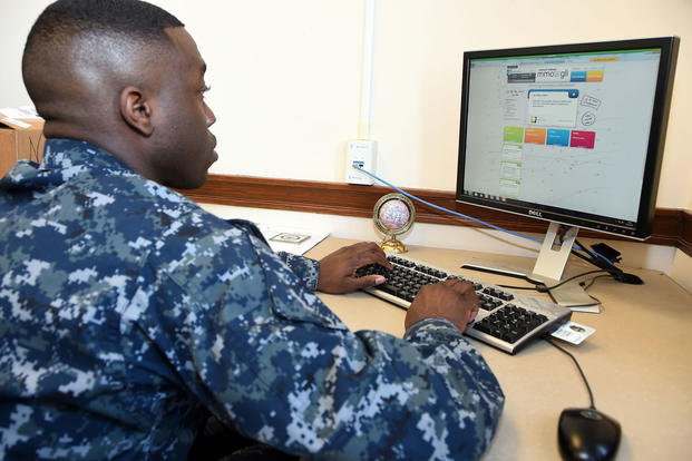 Operations Specialist Seaman Recruit Jeffrey Bradley from Tyler, Texas, and a student at Training Support Center Great Lakes, plays an interactive computer game called Recruit Reboot, April 20, 2016. (U. S. Navy photo/Scott A. Thornbloom)