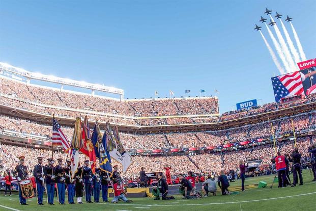 The Navy Blue Angels perform a flyover concluding the opening ceremony of Super Bowl 50 at Levi's Stadium in Santa Clara, Calif., Feb. 7, 2016. (Army Photo by Spc. Brandon C. Dyer)