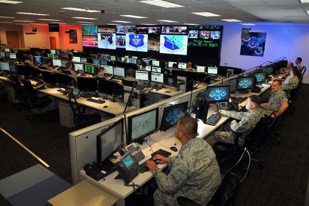 Personnel of the 624th Operations Center, located at Joint Base San Antonio-Lackland, conduct cyber ops for the Air Force component of U.S. Cyber Command. (U.S. Air Force/William Belcher)