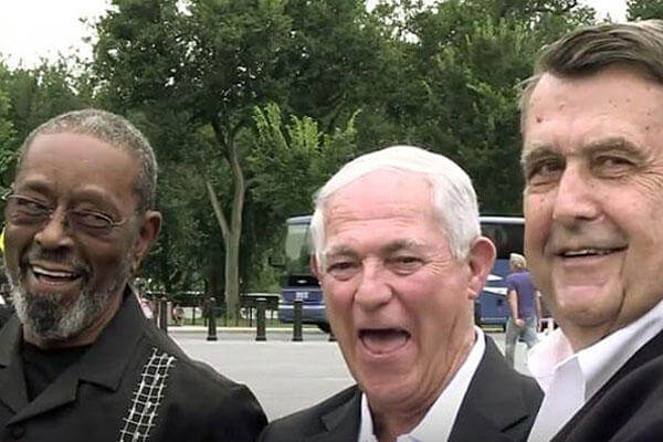 This screen capture from a State Department video shows F.W. "Mike" East, left; Larry C. Morris, center; and Jim Tracy in Washington, D.C. The three former Marines lowered the U.S. flag at the American embassy in Cuba in 1961.