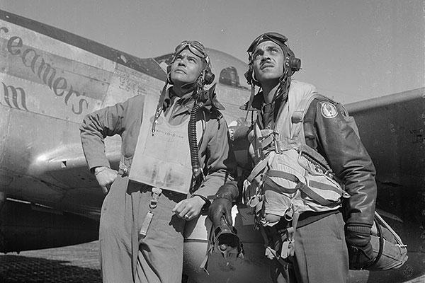 Col. Bengamin . Davis Jr. and Capt. Edward Gleed stand in in front of Lt. Charles White's "Creamer's Dream". (U.S. Air Force photo)