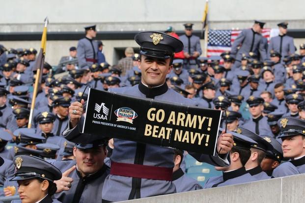 A West Point cadet holds a sign at the 2015 Army-Navy Game at Lincoln Financial Field in Philadelphia. Navy beat Army 21–17. (Military.com photo/Michael Hoffman)