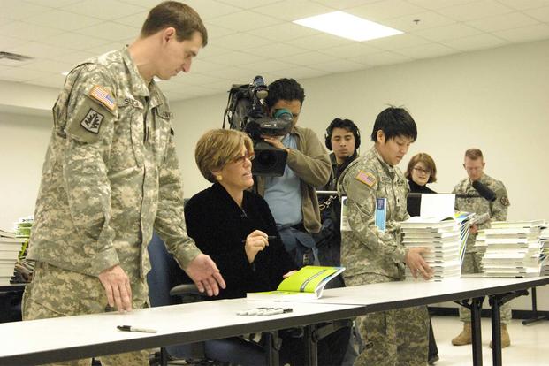 Financial advice guru Suze Orman signs books at Fort Dix, N.J. (Army Photo)