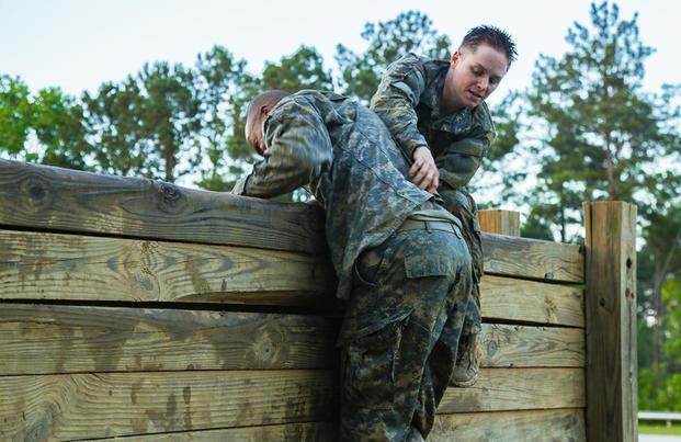 U.S. Army Soldiers display teamwork during the Ranger Course on Fort Benning, Ga., April 21, 2015. Soldiers attend the Ranger Course to learn additional skills in a physically and mentally demanding environment. (U.S. Army/Spc. Dacotah Lane/Released)