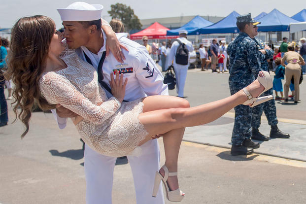 A sailor greets his wife during a 2015 homecoming celebration at Naval Base San Diego. Navy photo
