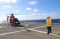 An MH-65 Dolphin helicopter prepares to take off from the Coast Guard Cutter Hamilton's flight deck, Nov. 11, 2018. (U.S. Coast Guard photo/Kiana Kekoa)