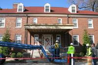 Workers at Fort Knox prepare to perform repairs and renovation work on an historic home at Fort Knox, Kentucky. Local historic preservation officials say agreements with Knox Hills and state cultural specialists allow them latitude to preserve the historical integrity of the homes while finishing projects much quicker. (Photo courtesy of Fort Knox Cultural Resources Office)