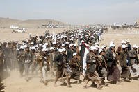 Houthi fighters march during a rally of support for the Palestinians