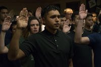 Julio Garcia, an enlistee in the U.S. Marine Corps, completes the Oath of Enlistment at Joint-Base San Antonio Fort Sam Houston, Texas.