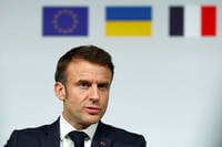 French President Emmanuel Macron speaks during a press conference at the Elysee Palace