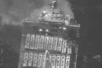 fire aboard the bulk carrier True Confidence after a missile attack by Yemen's Houthi rebels