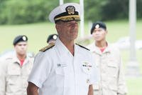 Adm. John C. Aquilino, commander of U.S. Pacific Fleet, stands as ‘Anchors Aweigh’ is played during the 2018 Governor’s Memorial Day Ceremony at Hawaii State Veterans Cemetery.